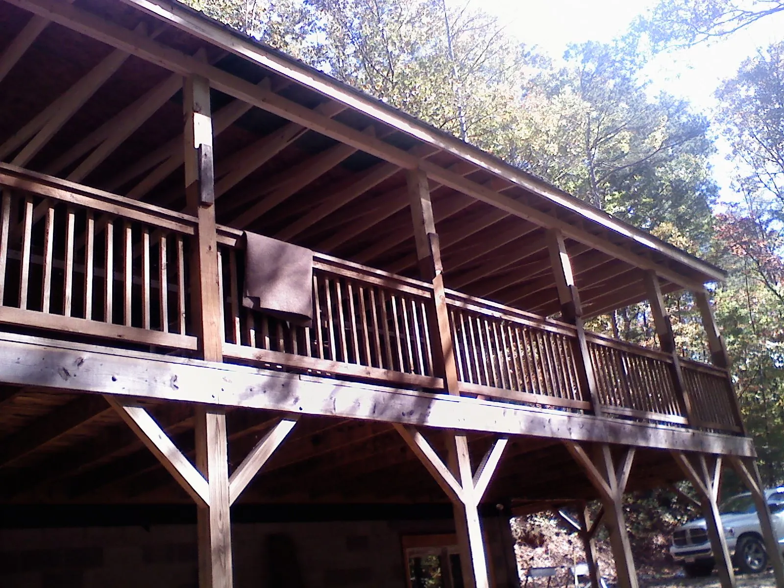 Timber framing under a new elevated porch and deck — Roof Leak Repair in Zirconia by Roofing Brothers